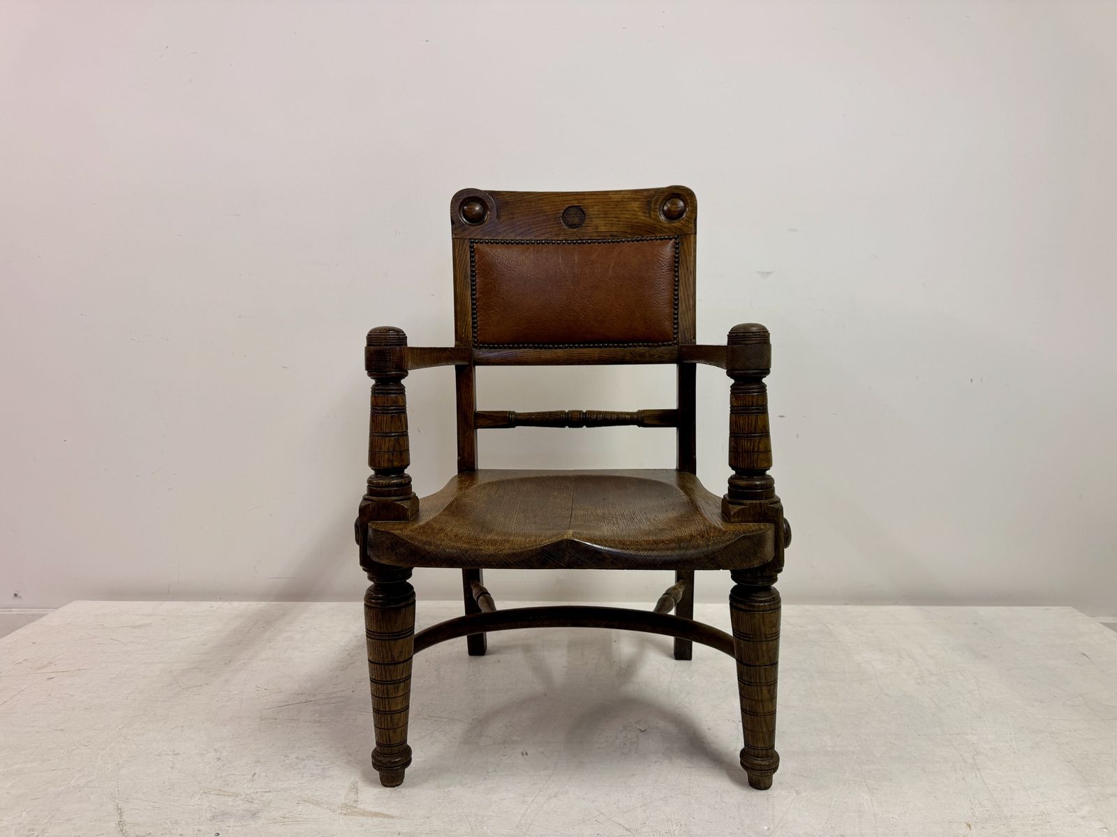 Early 20th Century Arts And Crafts Oak Armchair With Saddle Seat photo for sale