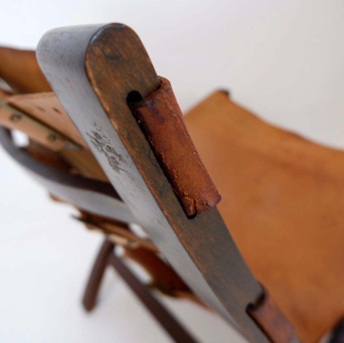 photo for sale Mid Century Leather And Wood Folding Armchair, 1950s