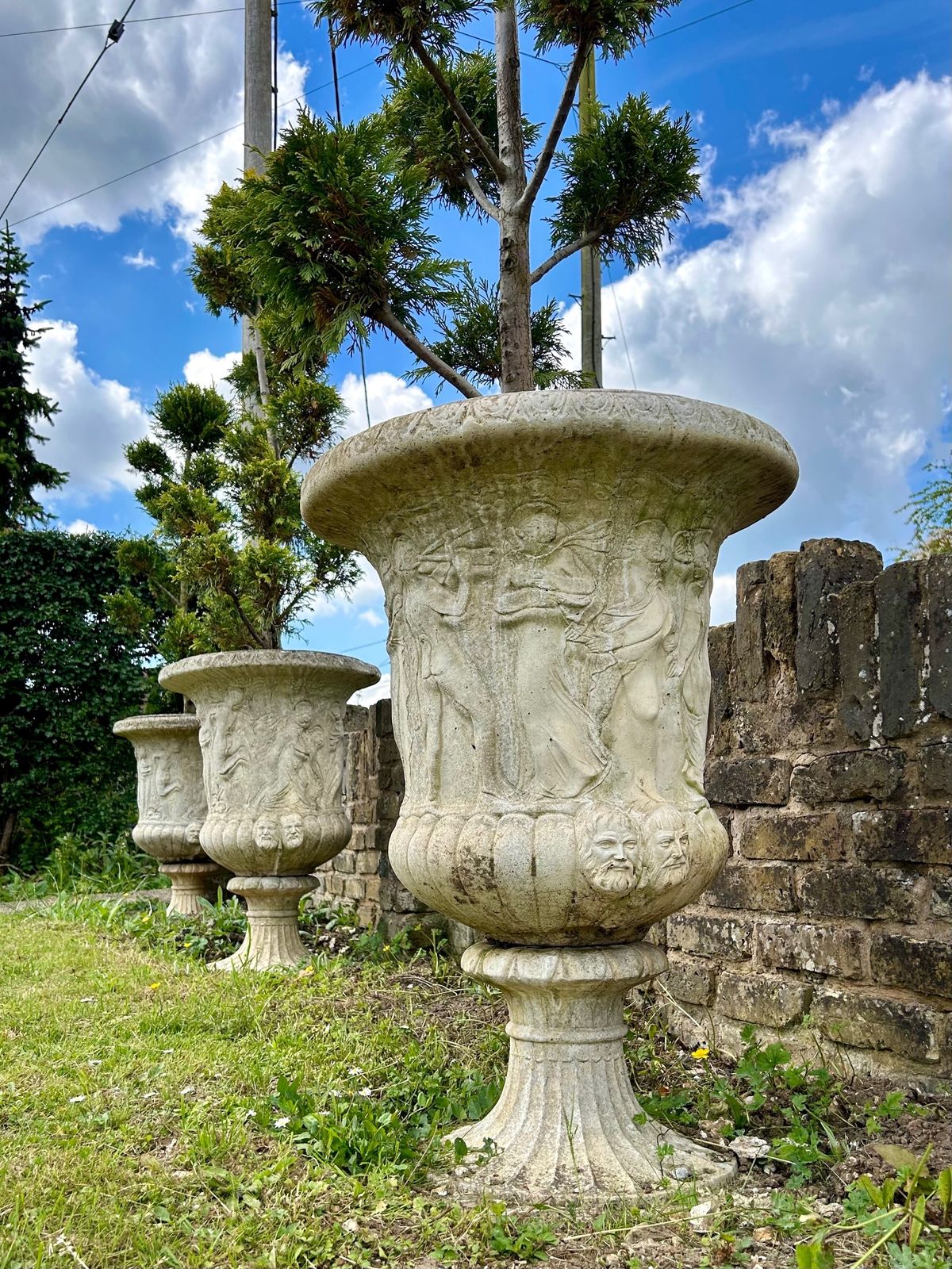 4500.0 Set Of 3 Weathered Urns Planters With Cloud Trees Antique Style Garden Urns photo