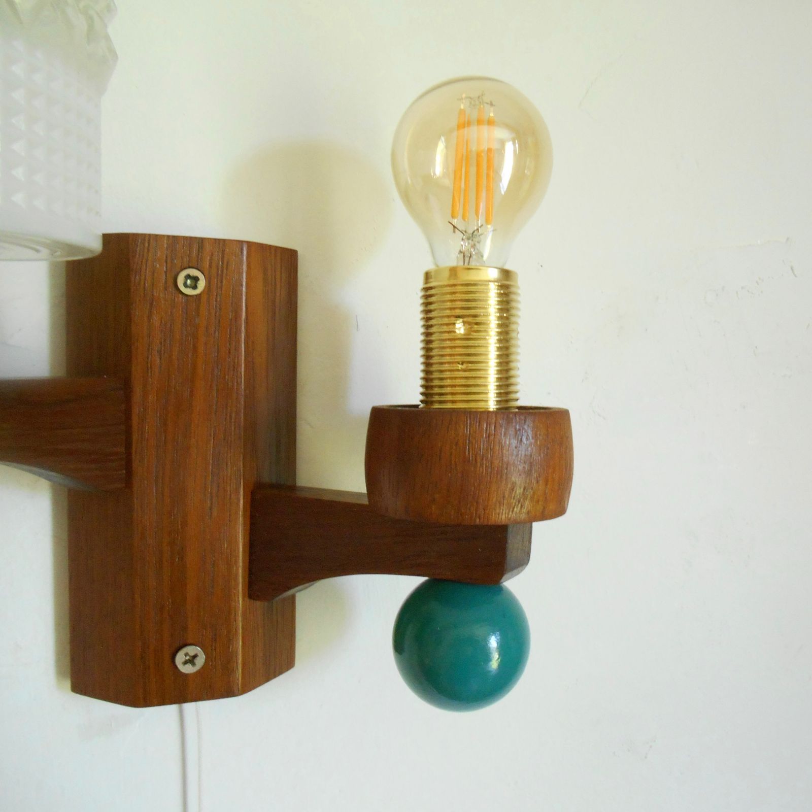 photo furniture A Pair Of Mid Century Modern Dual Stem Teak Wall Lamps