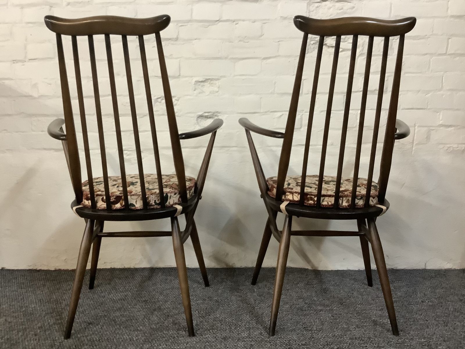 photo for sale Pair Of Ercol Windsor Goldsmiths Carver Chairs.