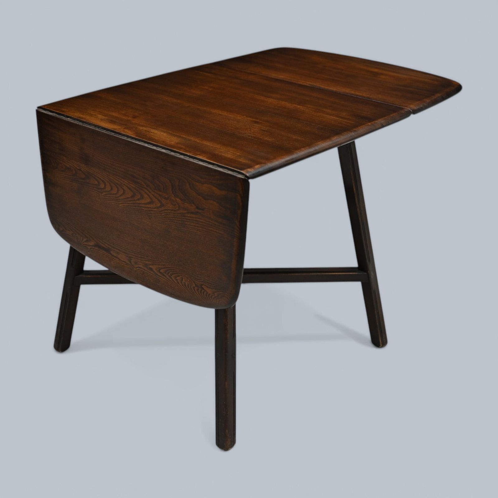 487.0 Ercol Drop Leaf Dining/Kitchen Table Seats Up To 6 Dark Finish Free Uk Delivery photo