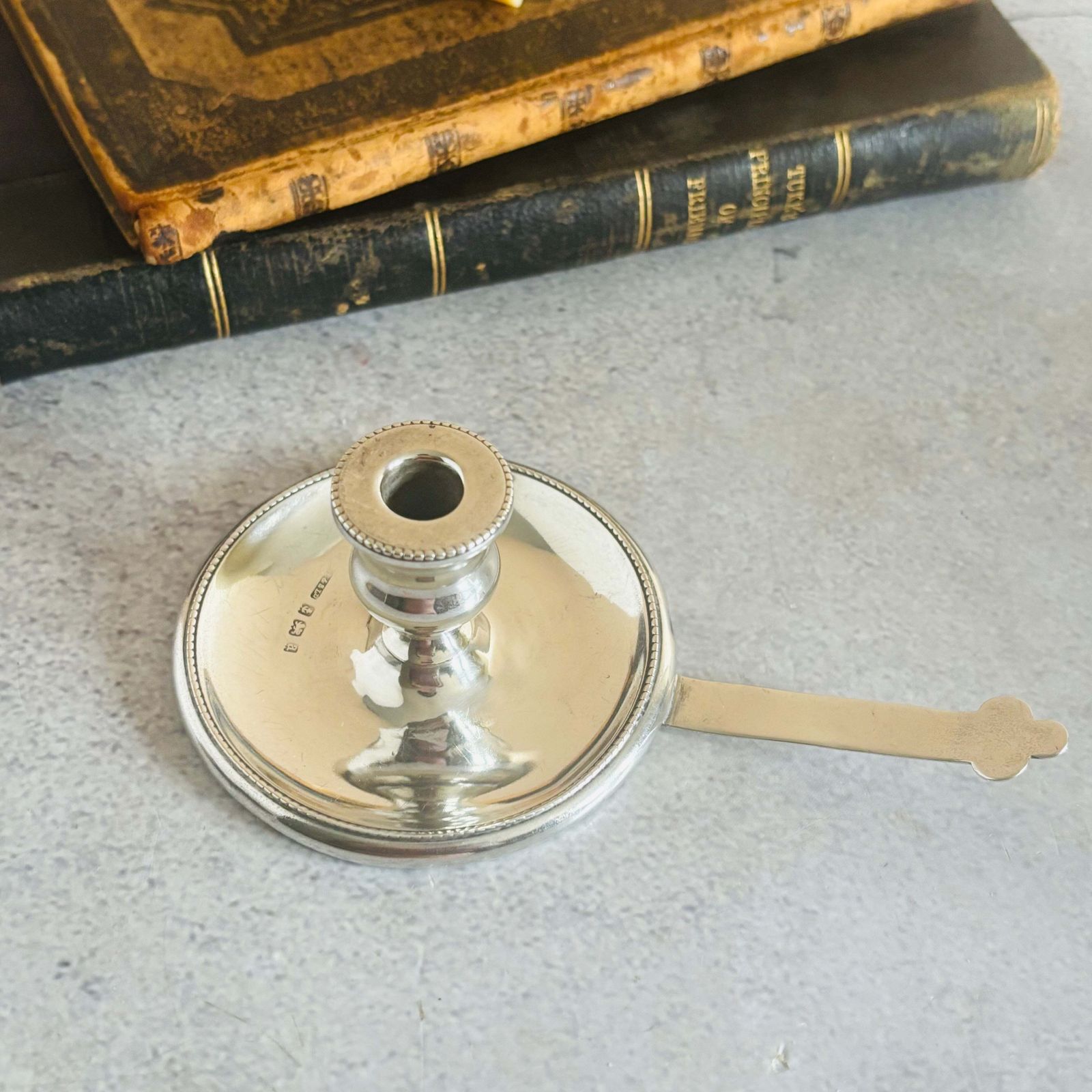Antiek sterling zilveren kamerstick met snuiter photo Woonaccessoires