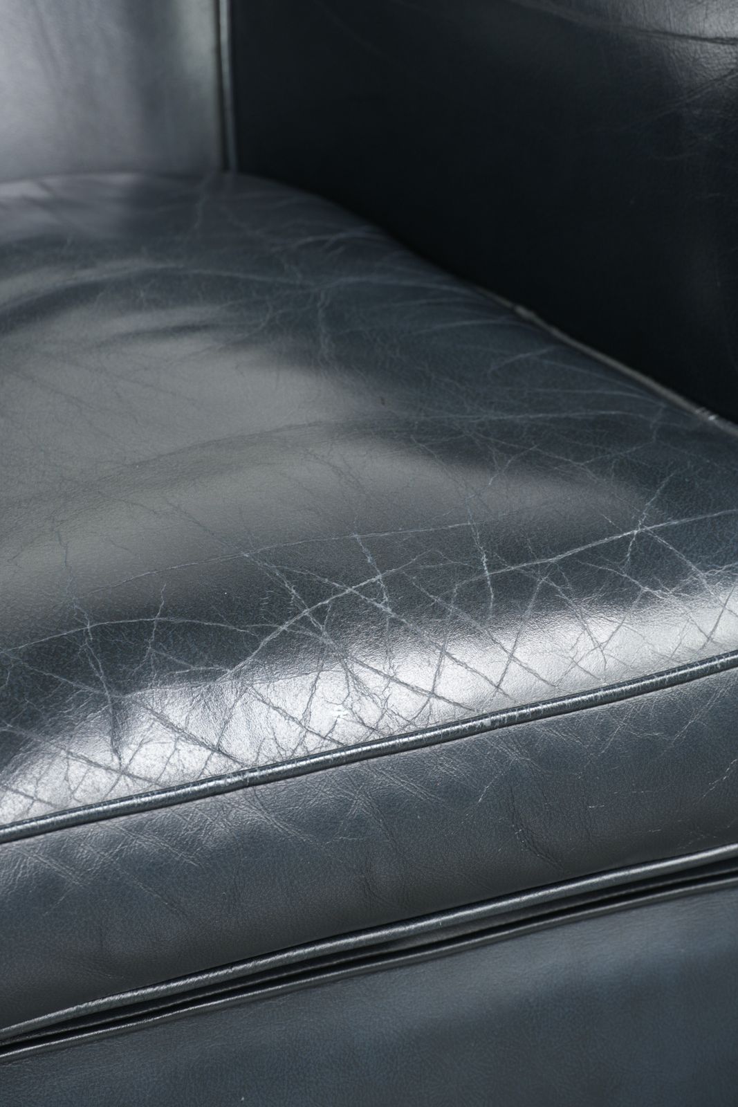 photo for sale Dark Blue Club Armchair Made Of Cowhide Leather With A Timeless Design