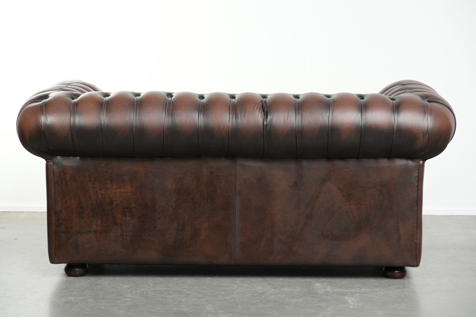 Lovely English Style Cowhide Leather Chesterfield 2 Seater Sofa In A Beautiful Timeless Brown Color. photo for sale
