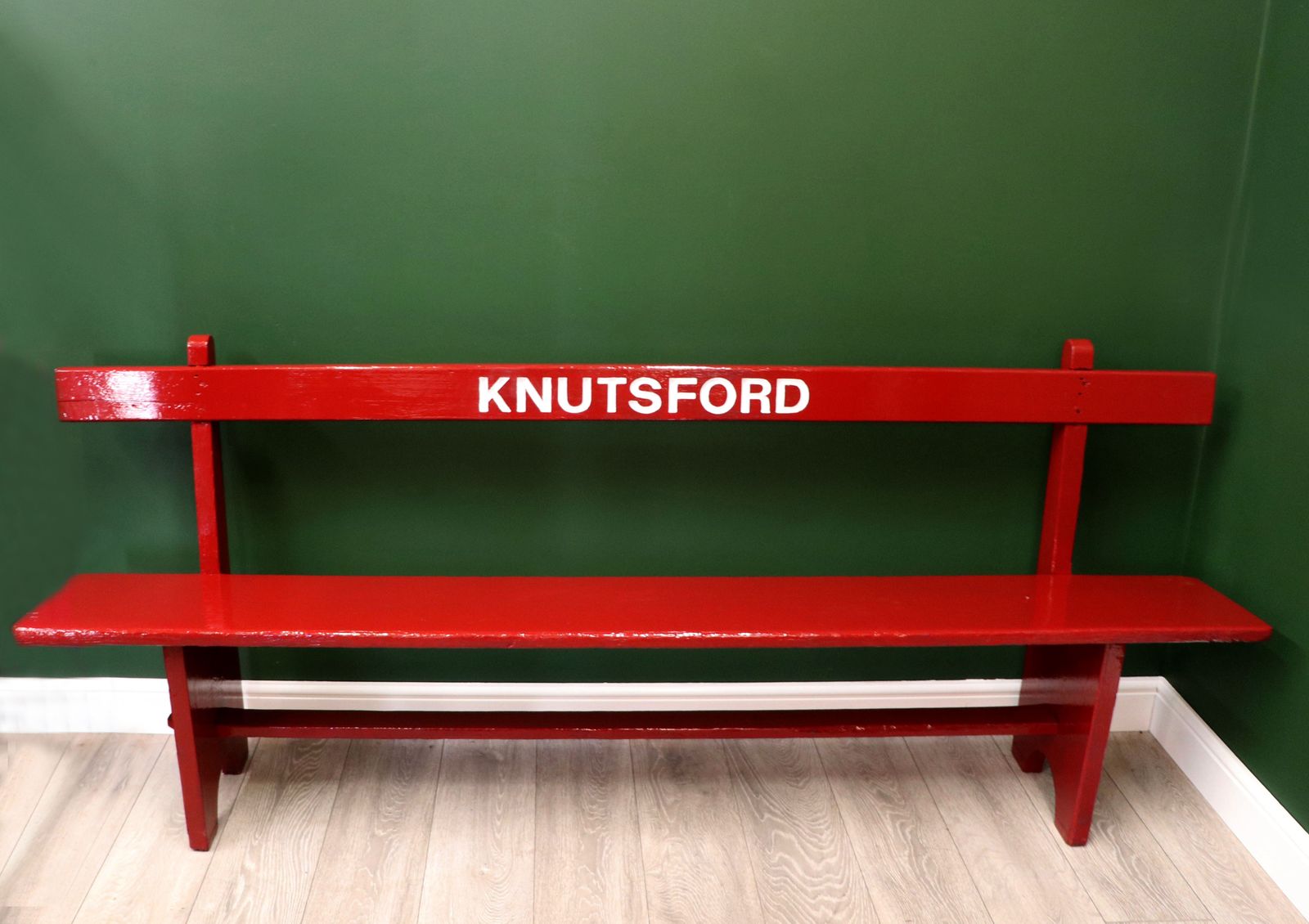 A Lovely Red Painted Wooden Bench Later Inscribed With Knutsford. photo furniture