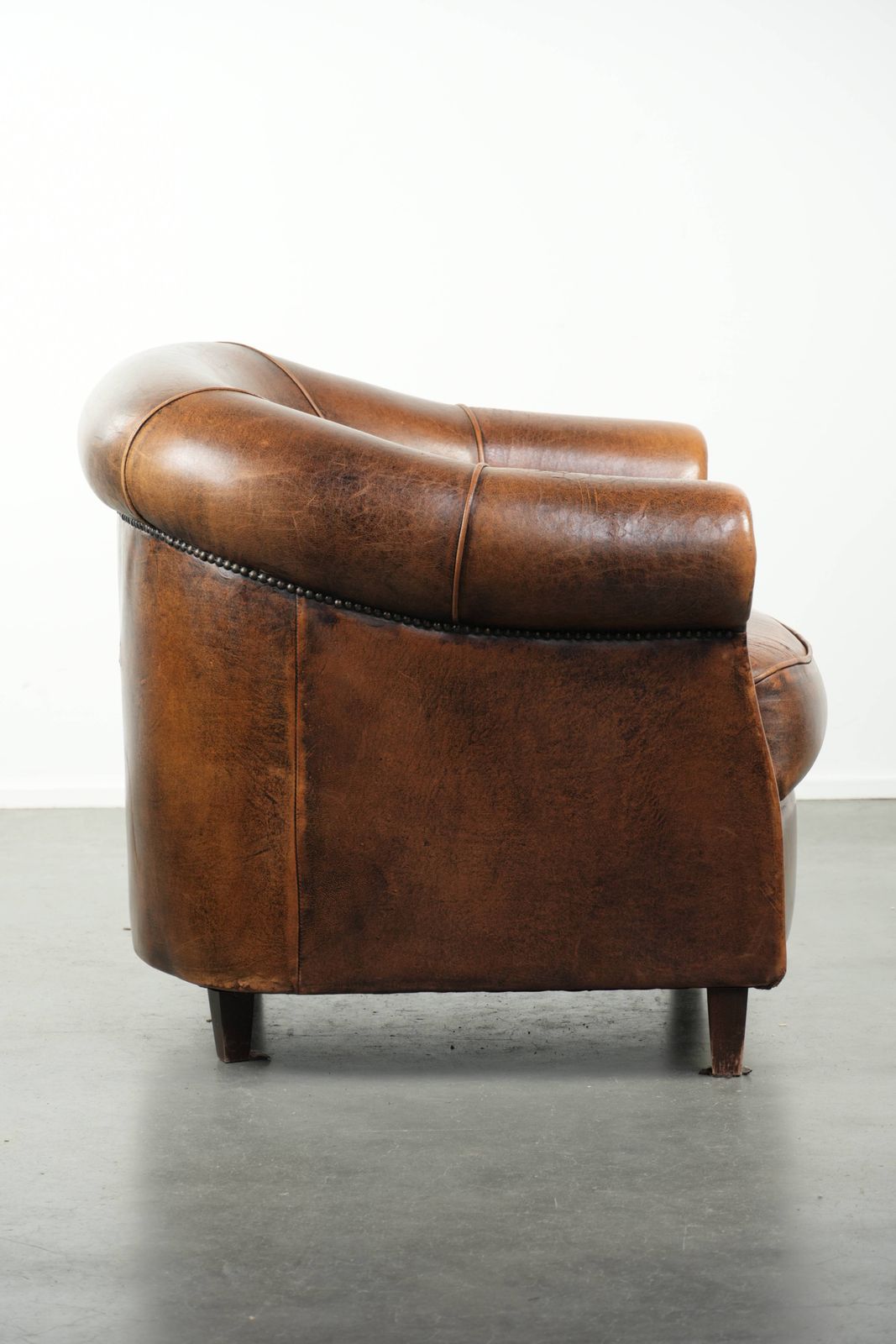 Characterful And Comfortable Club Armchair Made Of Sheepskin With A Fixed Seat Cushion And Excellent Colors photo for sale