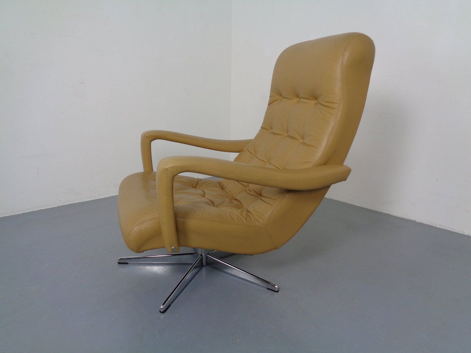 1081.0 Set Of Leather Swivel Easy Chair And Ottoman, Switzerland, 1960s photo