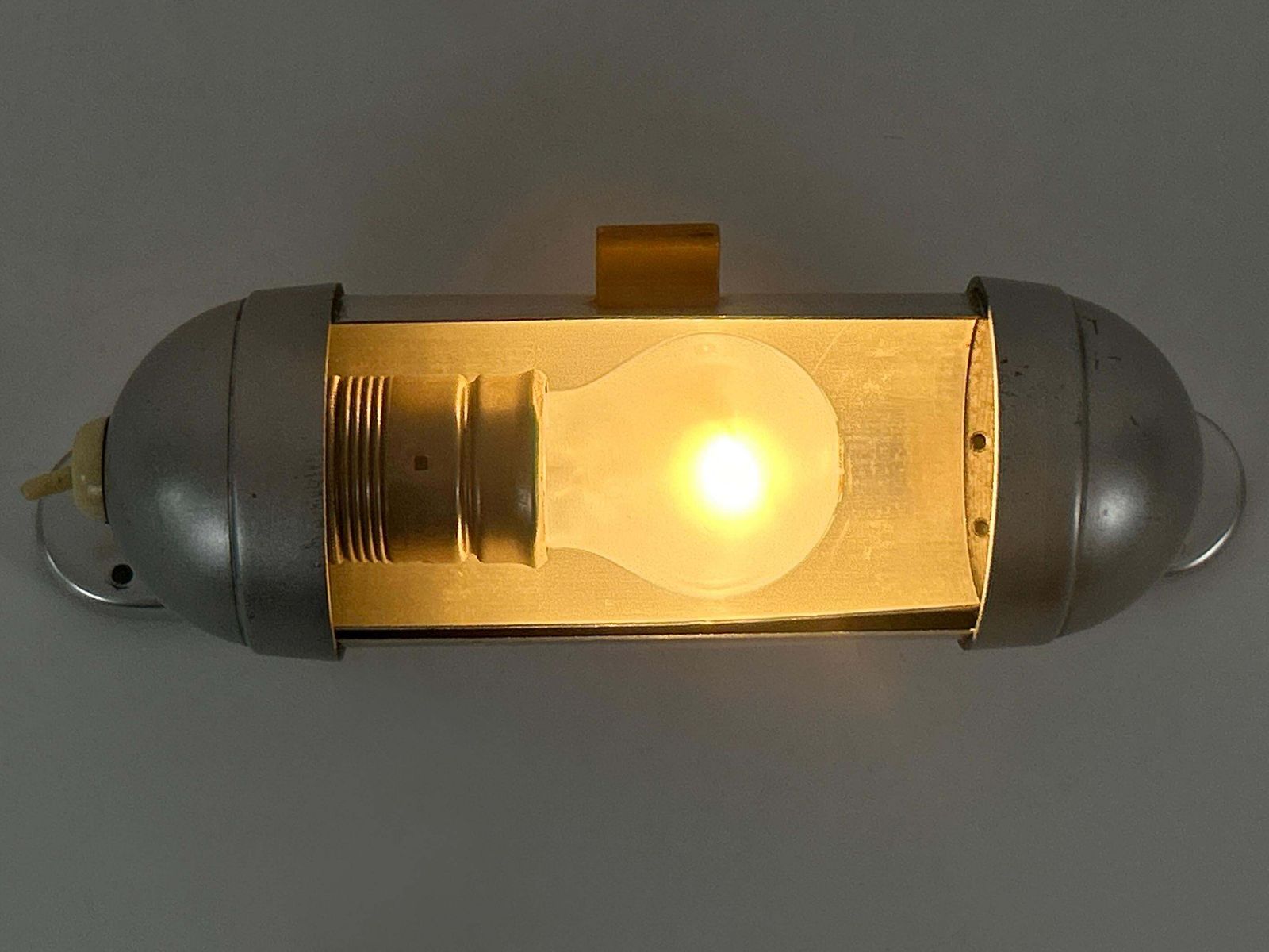 Streamline Design Bauhaus Sub Marine Cabinet Sconce By König Germany 1940s photo vinterior