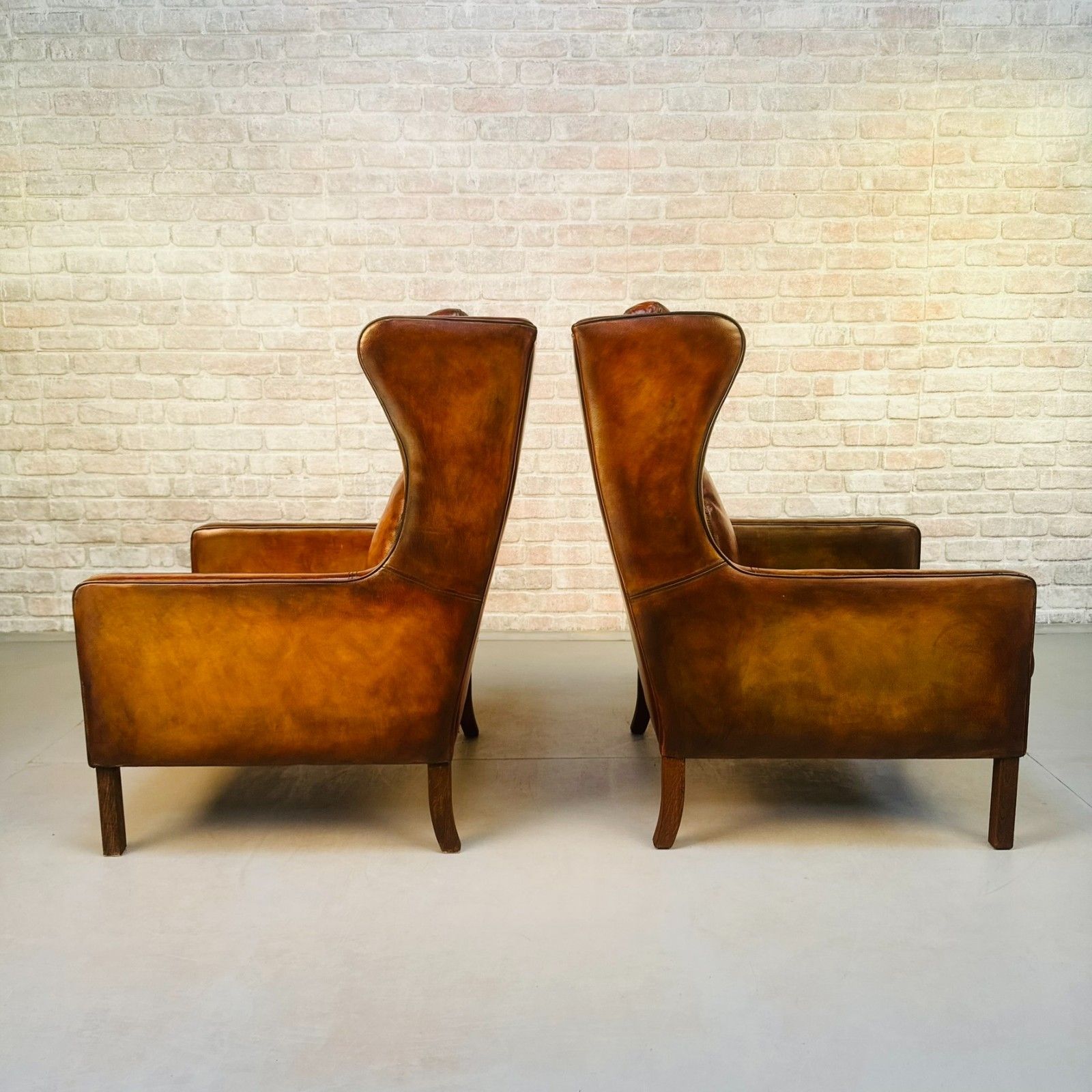 Pair Vintage Danish Wingback Chairs & Footstool Tan Leather Lounge Set photo vinterior