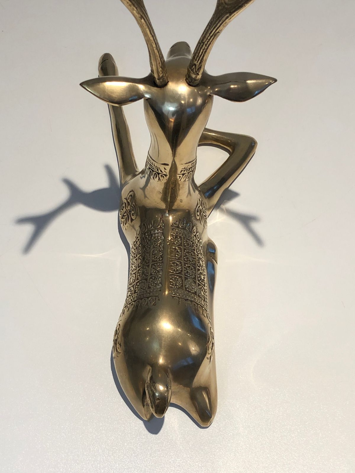 photo vinterior Pair Of Bronze Reclining Deer Engraved With Shamanic Motifs. French Work. Circa 1970