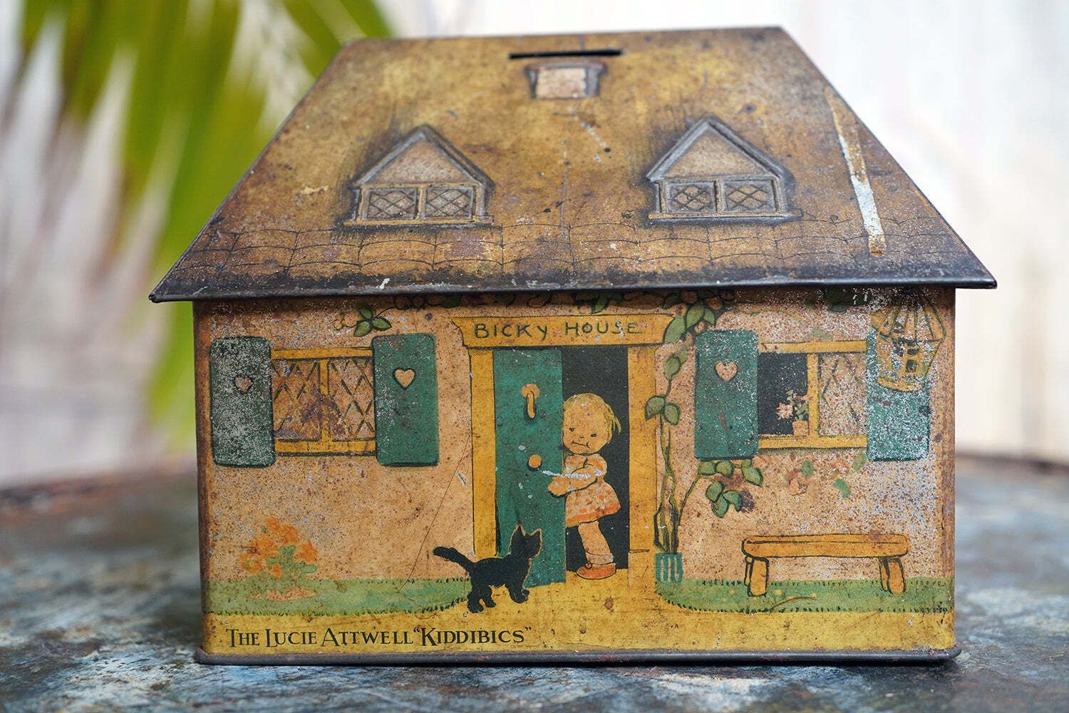 A Charming C.1930s Crawford & Sons Ltd Tin Biscuit Barrel Money Box; 'Bicky House' By Mabel Lucie Attwell