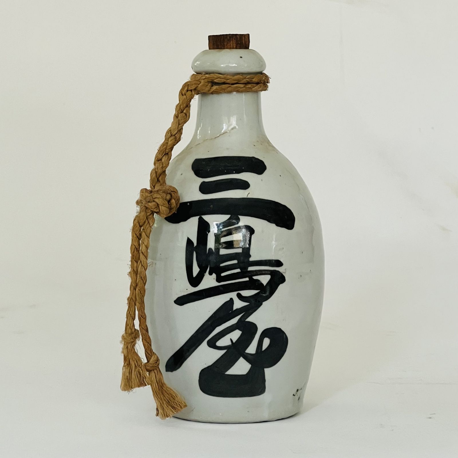 Japanese Kayoi Tokkuri Stoneware Sake Bottle.