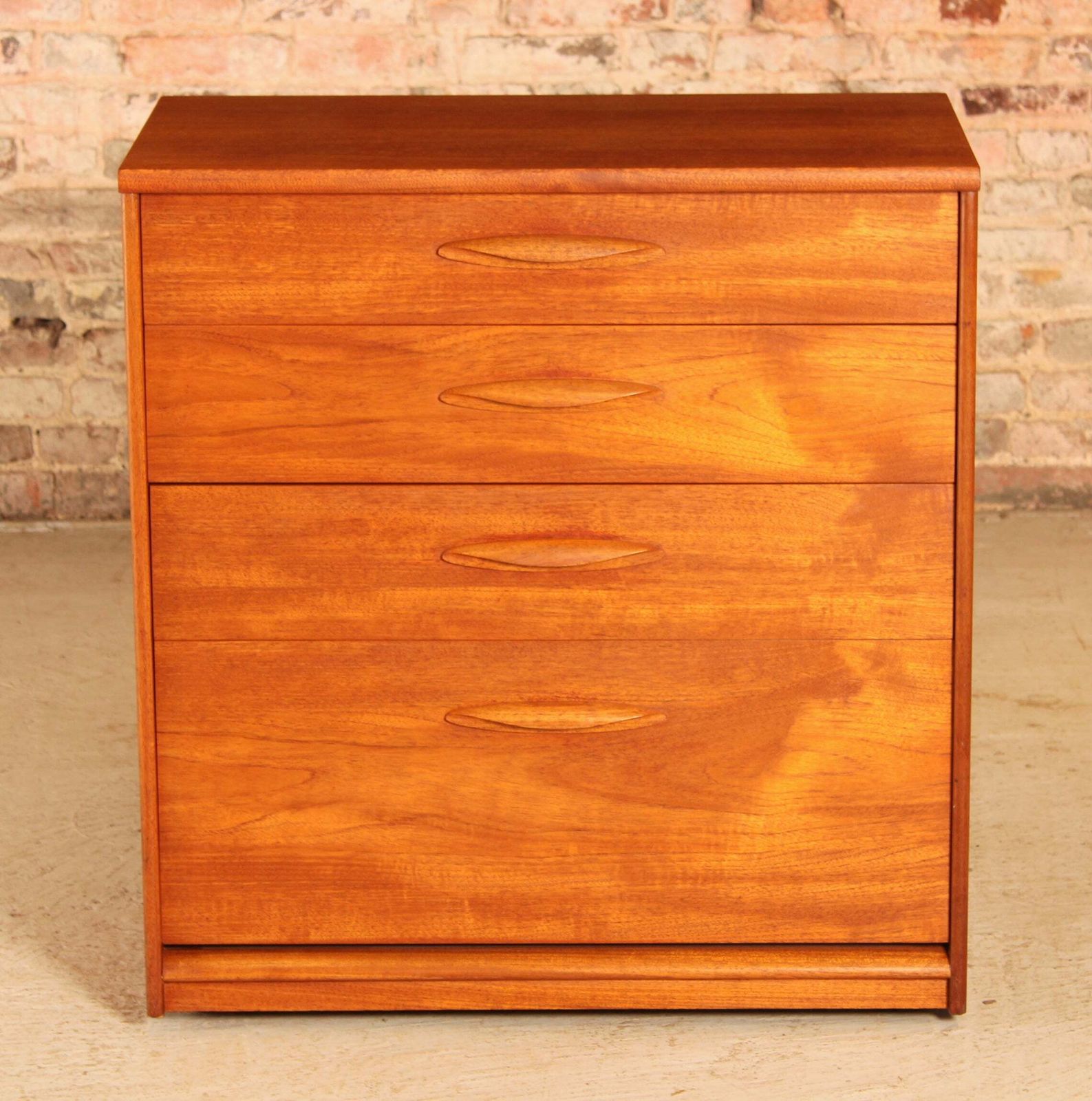 Mid Century Teak Chest Of 4 Drawers On Casters By Austinsuite, Circa 1960s photo furniture