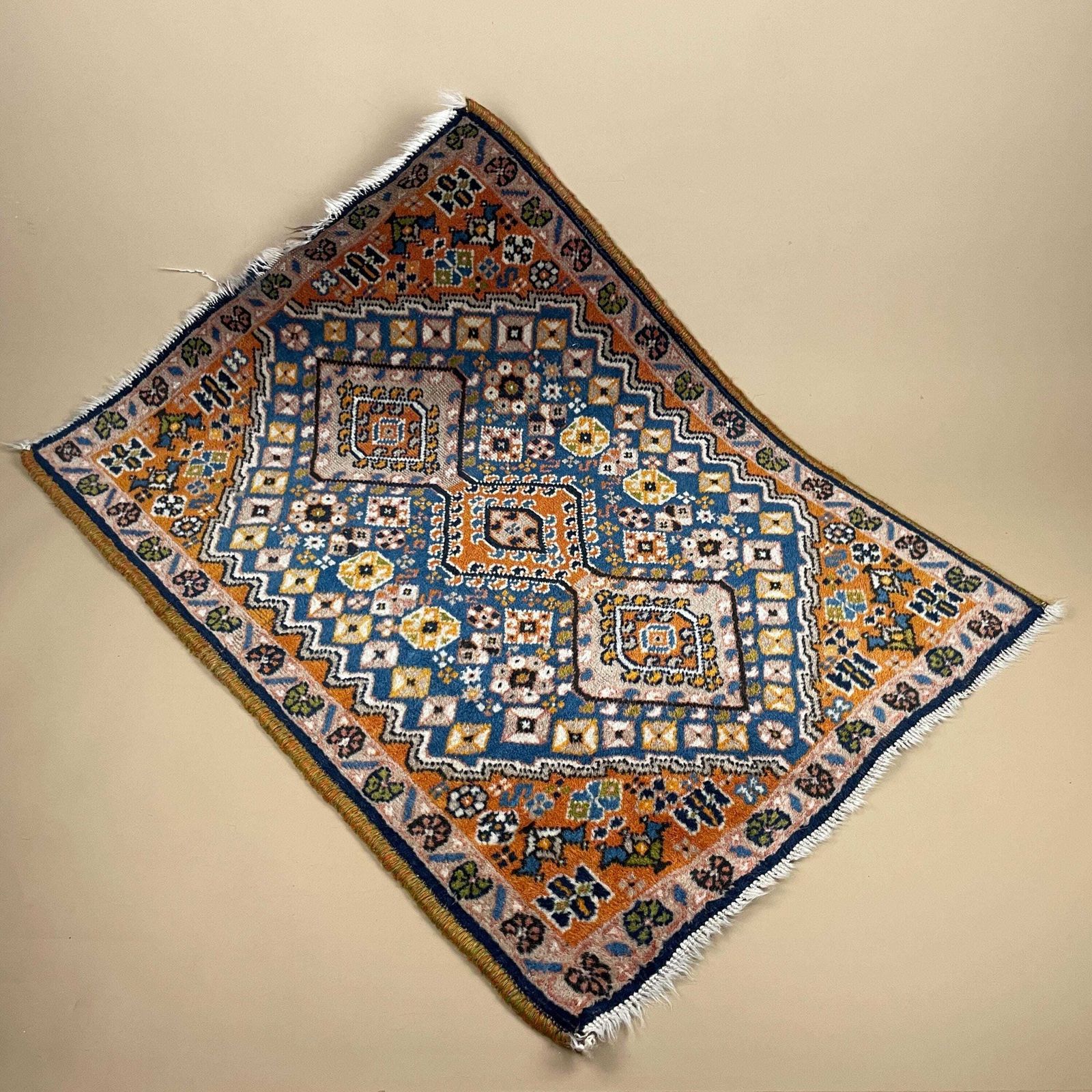 Small Accent Rug Wool Middle Eastern Style Decorative Tasselled Orange Blue Detailed Pattern photo vintage