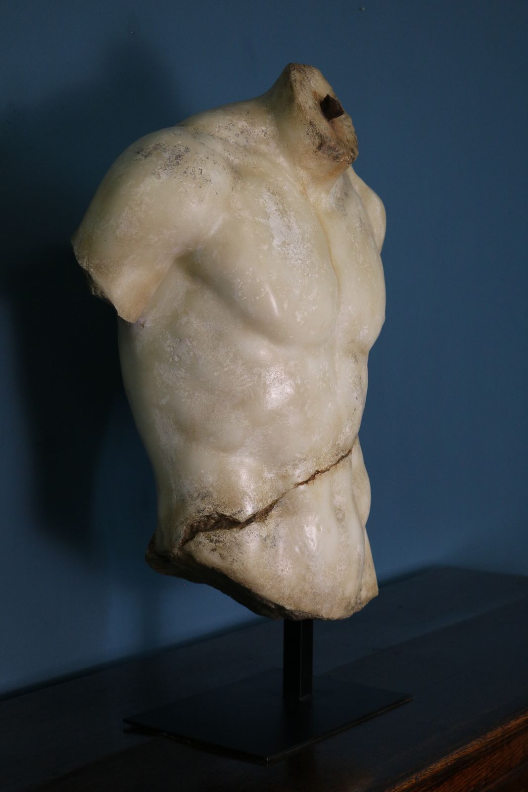 Sculpture Of A Male Torso In The Hellenistic Style photo 1080.0