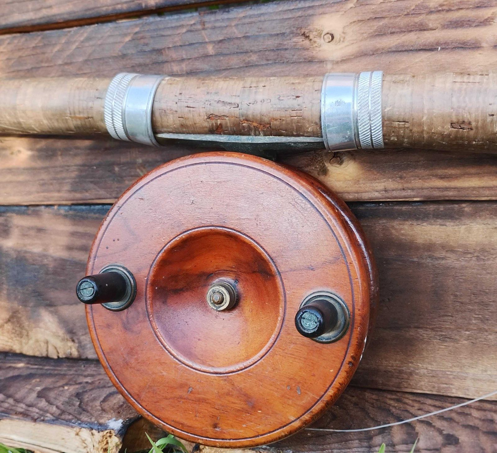 Antieke vishaspel met sterrenmotief, mahonie en messing photo Woonaccessoires