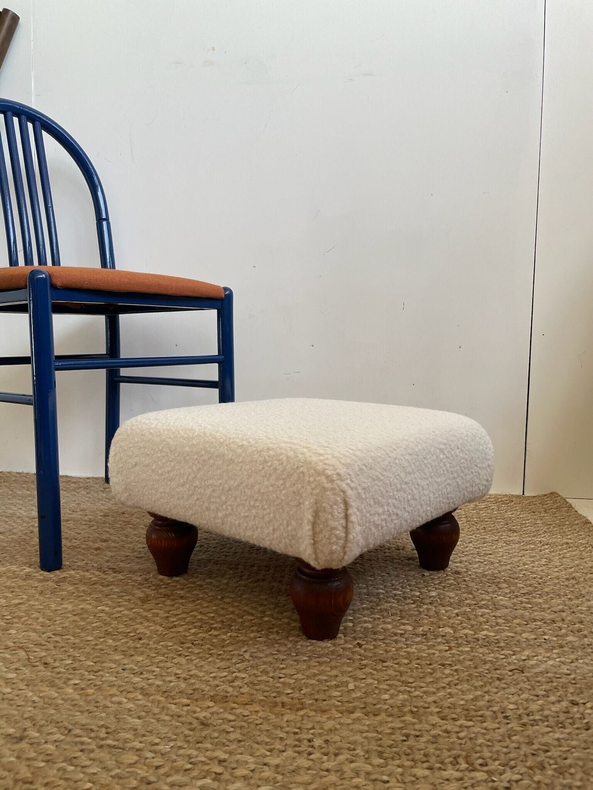 Chunky Low Lying Footstool With Tapered Legs And Cream Boucle Fabric photo for sale