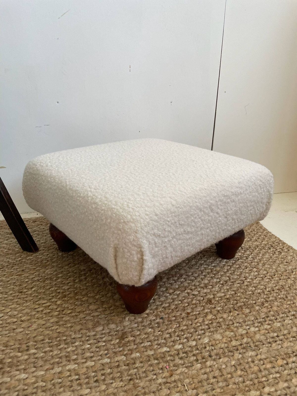 Chunky Low Lying Footstool With Tapered Legs And Cream Boucle Fabric photo Furniture