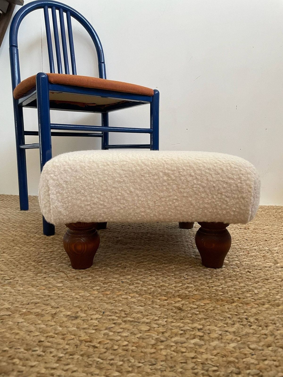 Chunky Low Lying Footstool With Tapered Legs And Cream Boucle Fabric photo 144.0
