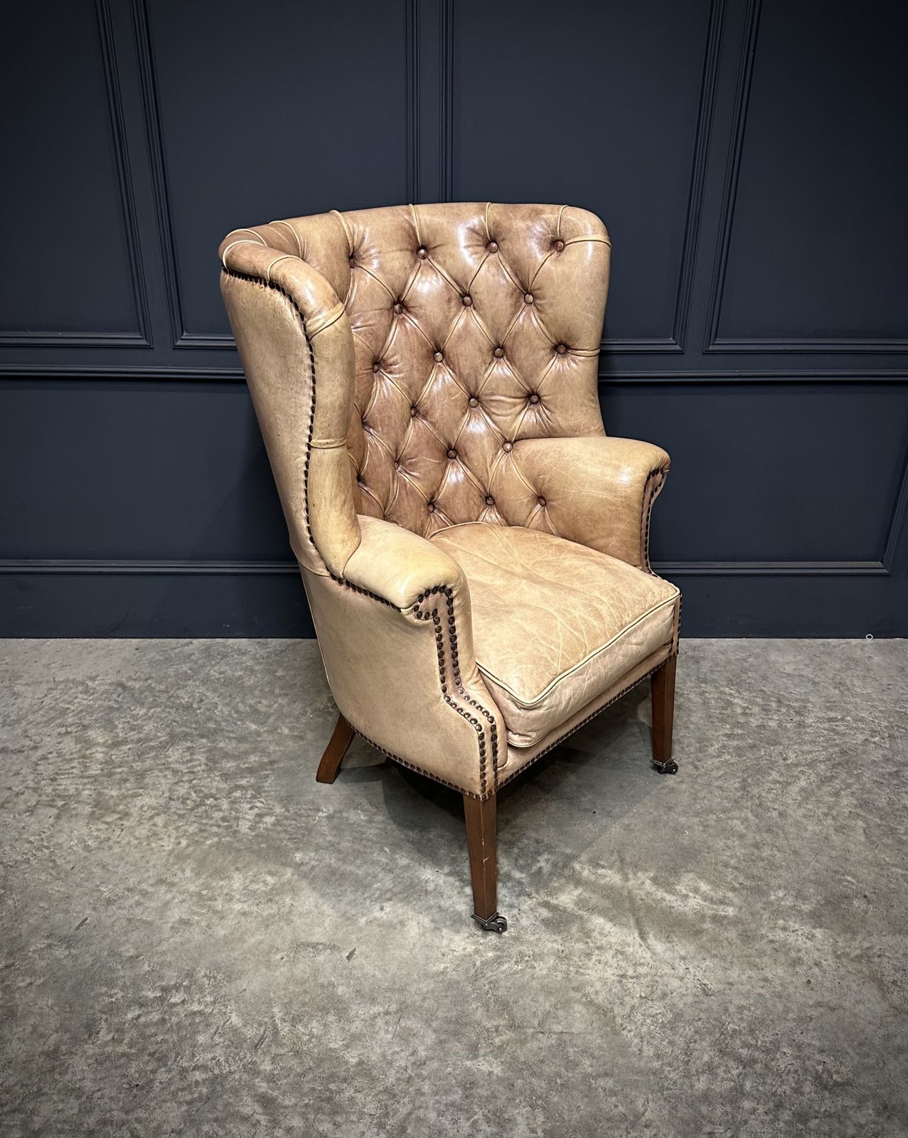 photo furniture Buttoned Leather Porters Wing Chair