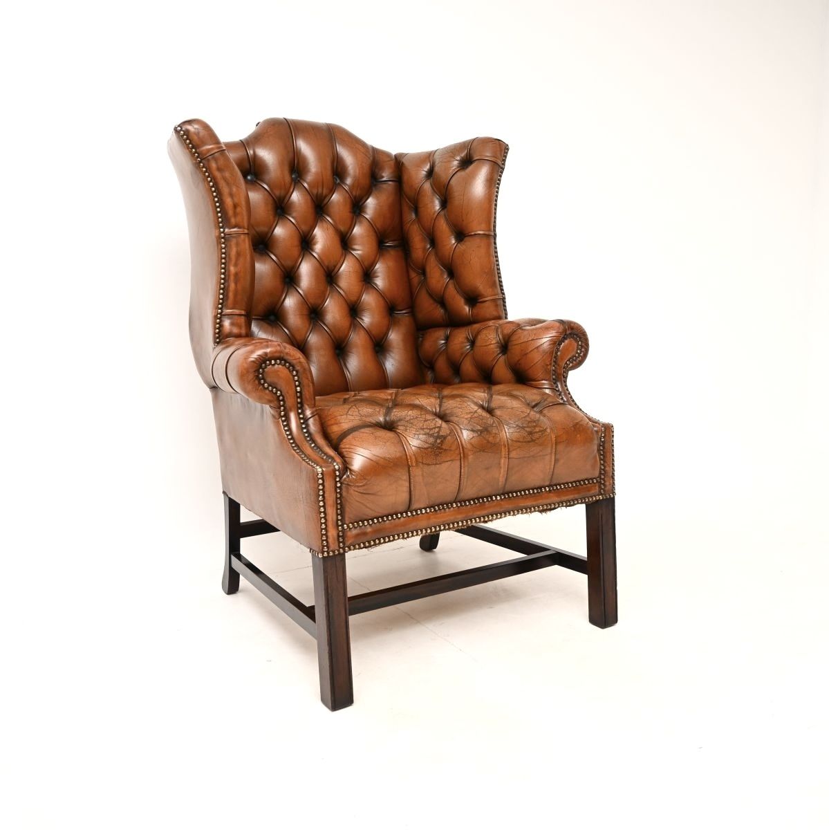 Antique Deep Buttoned Leather Wing Back Armchair