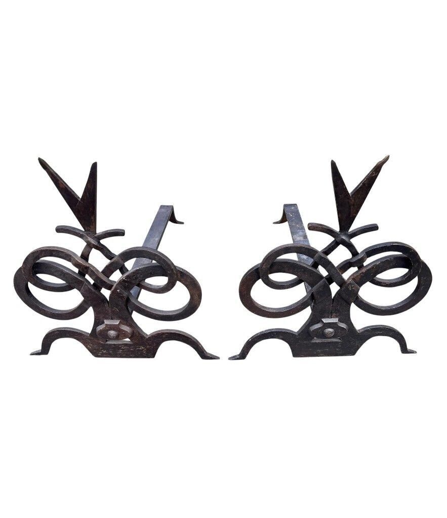 3475.0 A Pair Of French Hand Forged Wrought Iron Fire Dogs In The Style Of Gilbert Poillerat photo