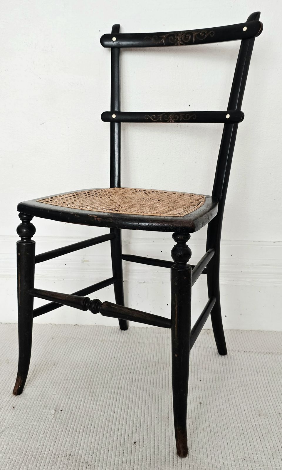 Furniture A Victorian Ebonised Salon Chair With Rattan Seat  & Bone Inlay. photo