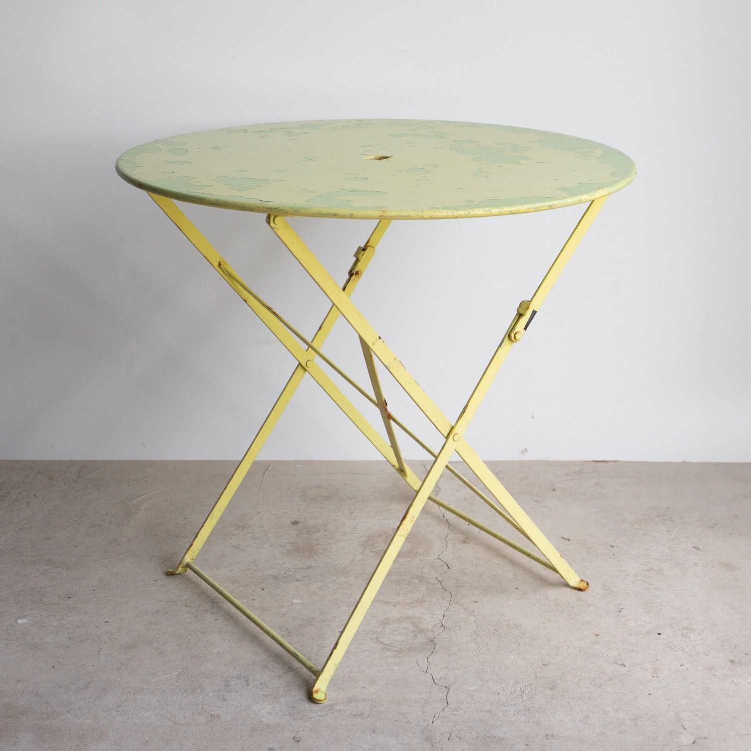 photo furniture Vintage French Lemon And Lime Painted Iron Circular Bistro Table, C. 1950s