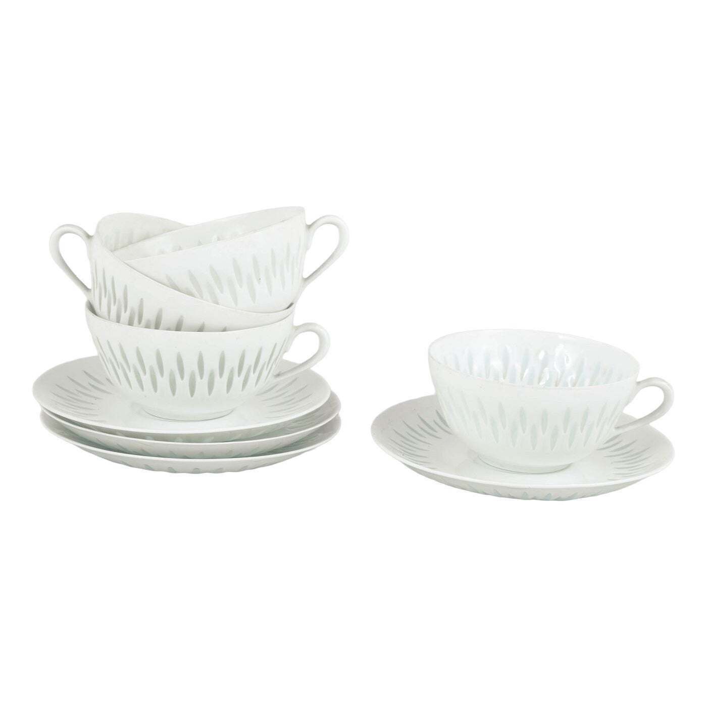 Friedl Holzer Kjellberg, Arabia. 4 tasses à thé et soucoupes en porcelaine. Motif riz