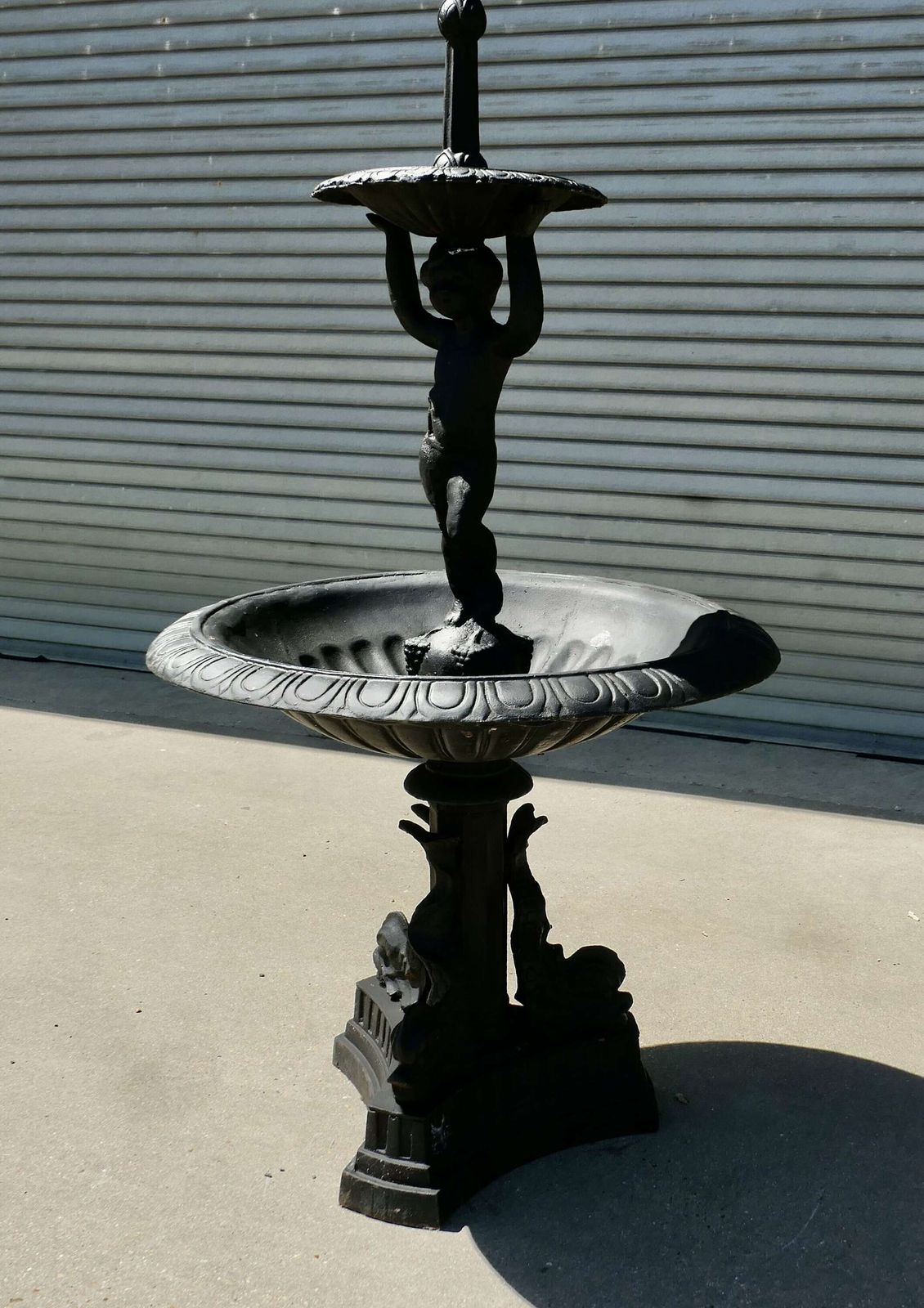 Black Cast Iron Fountain With Cherub Boy A Good Piece In A Classical Style With Dolphins photo furniture
