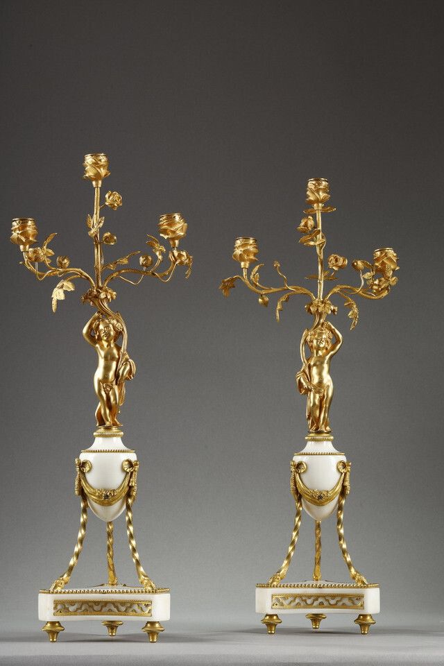 Paar kandelaars in Louis XVI-stijl photo Woonaccessoires