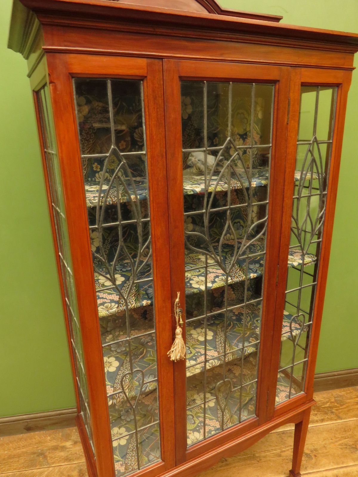 photo vinterior Art Nouveau Glazed Cabinet With Peacock Fabric Interior