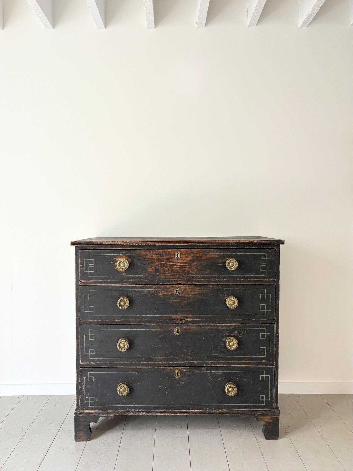 Ebonised Chest Of Drawers With Stencilled And Painted Geometric Detail