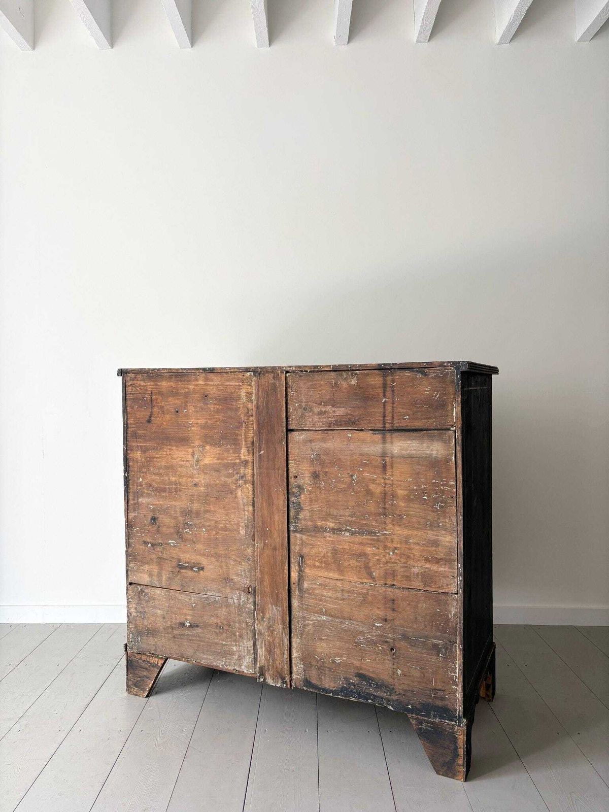 2950.0 Ebonised Chest Of Drawers With Stencilled And Painted Geometric Detail photo