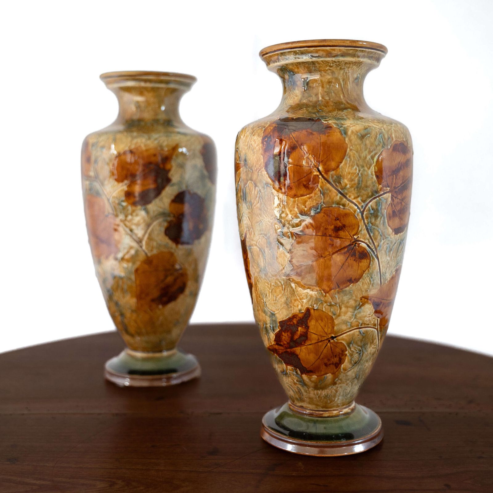 Pair Of Royal Doulton Lambeth 'Autumn Foliage' Vases. photo furniture