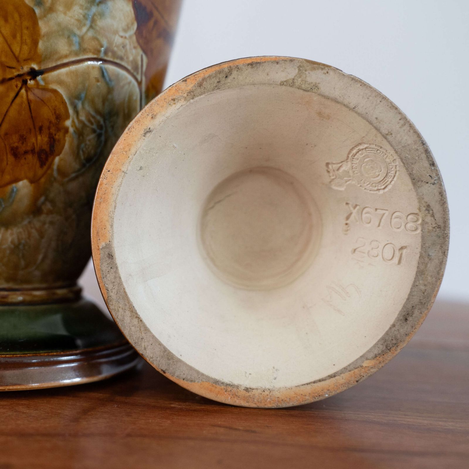 photo furniture Pair Of Royal Doulton Lambeth 'Autumn Foliage' Vases.