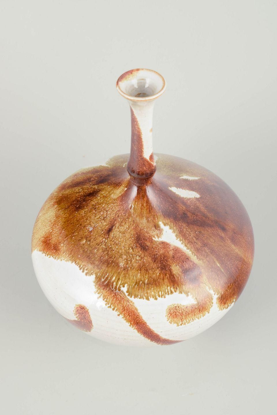 Isak Isaksson. Steengoed vaas met hoge slanke hals en vloeiend glazuur. photo furniture