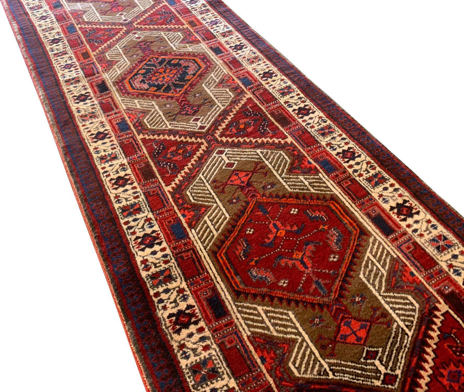 Handgemaakt loperkleed, geometrisch oosters motief, rood wollen tapijt photo for sale
