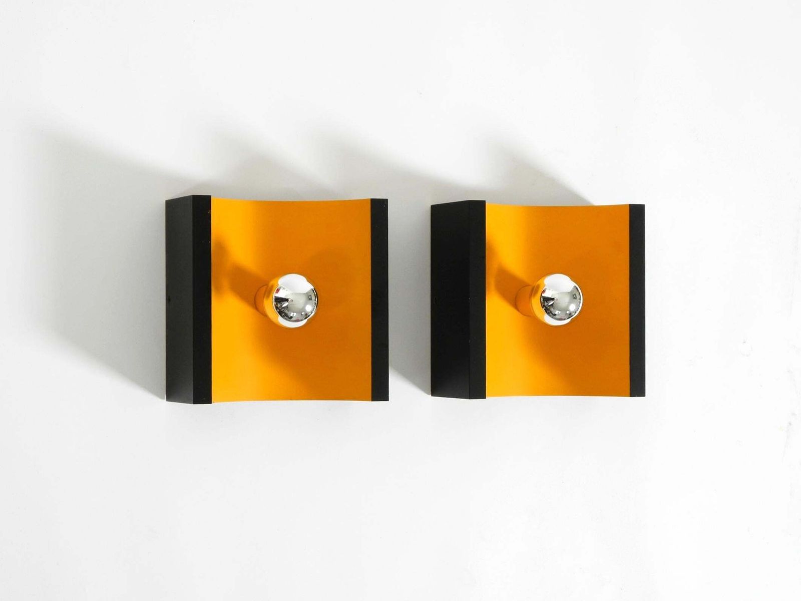 Een paar Space Age metalen wandlampen uit de jaren 1960 van Klaus Hempel voor Kaiser Leuchten photo furniture
