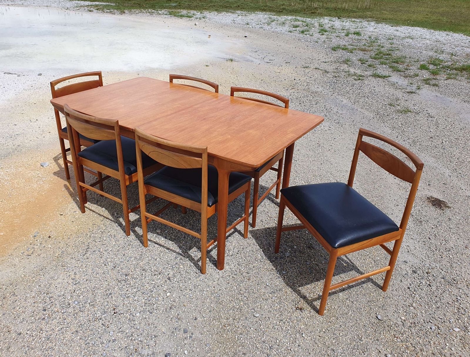 A Mid 20thc Teak, Extending Dining Table And Six Chairs By McIntosh Of Kirkcaldy. photo for sale