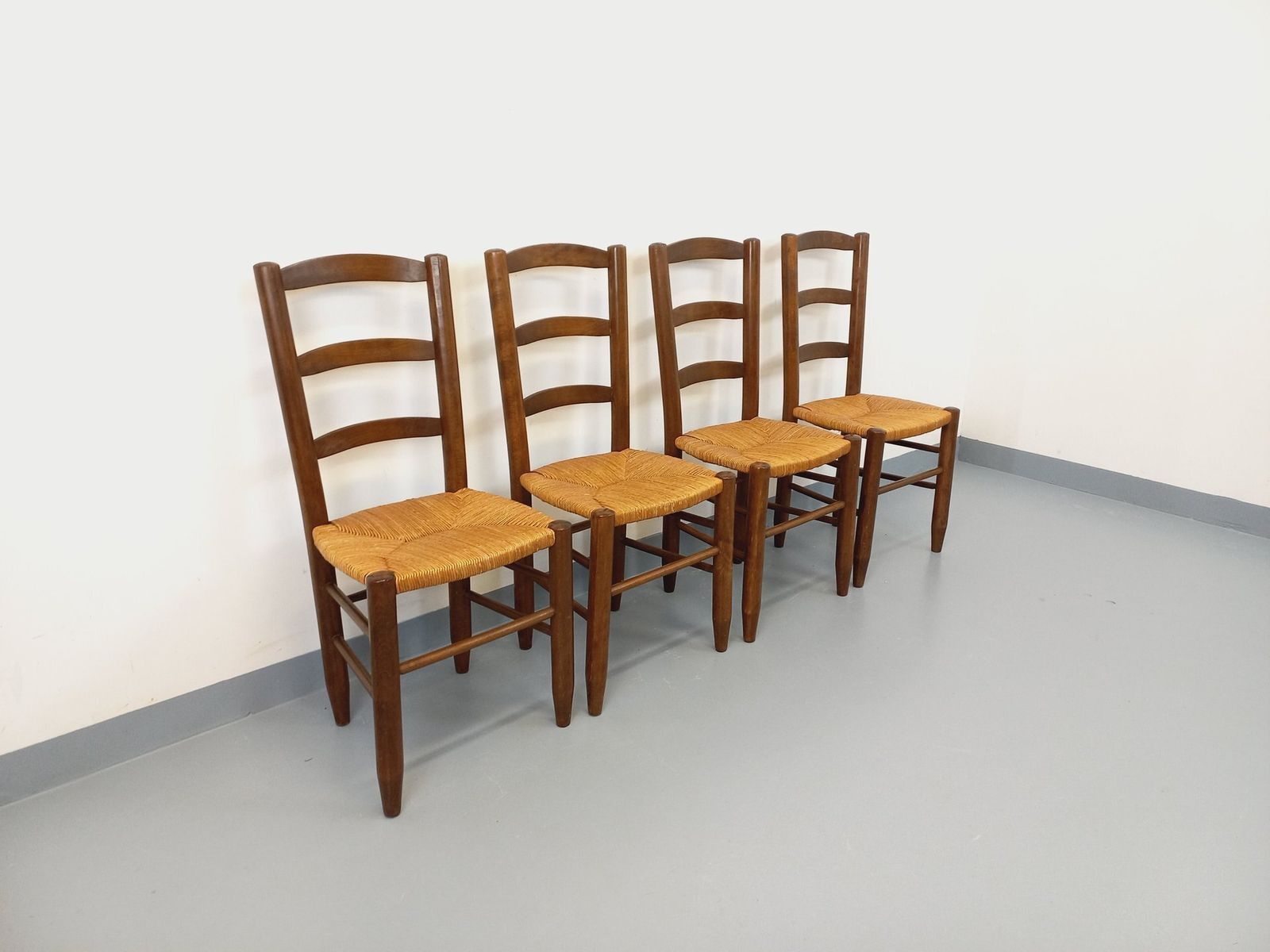 4 Brutalist Chairs Made Of Wood And Straw