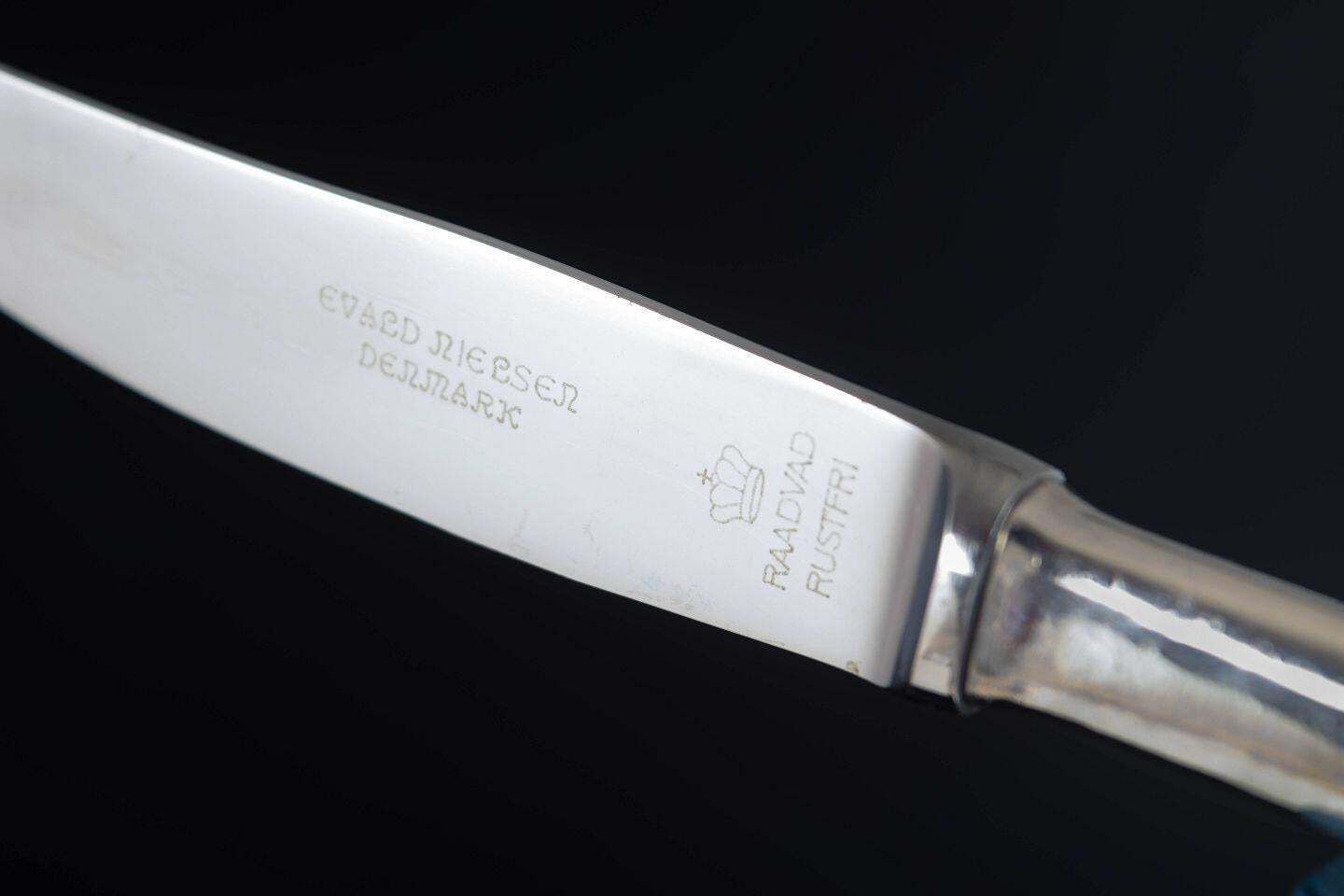 Evald Nielsen. Set van vier lunchmessen in sterling zilver en roestvrij staal. photo vinterior