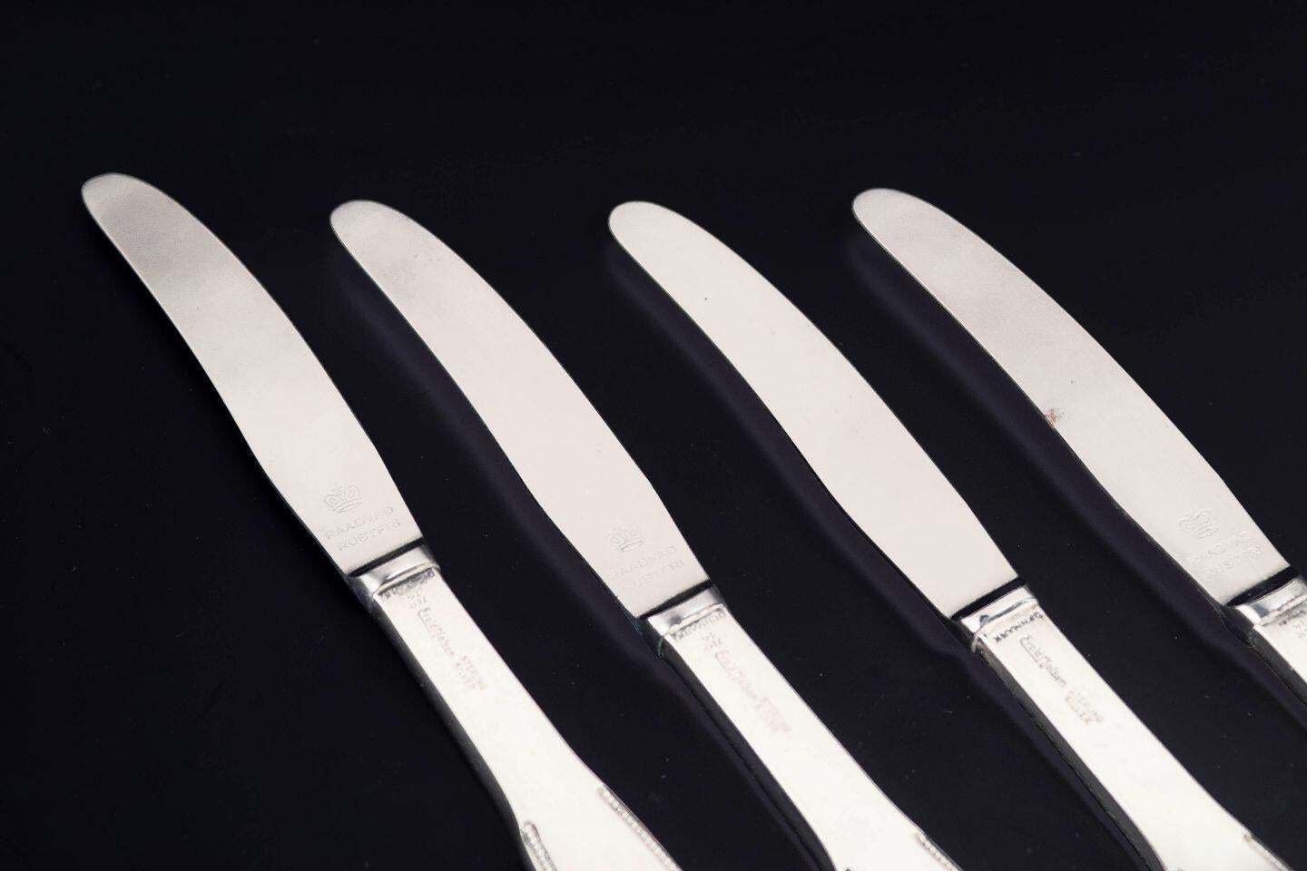 Evald Nielsen. Set van vier lunchmessen in sterling zilver en roestvrij staal photo furniture