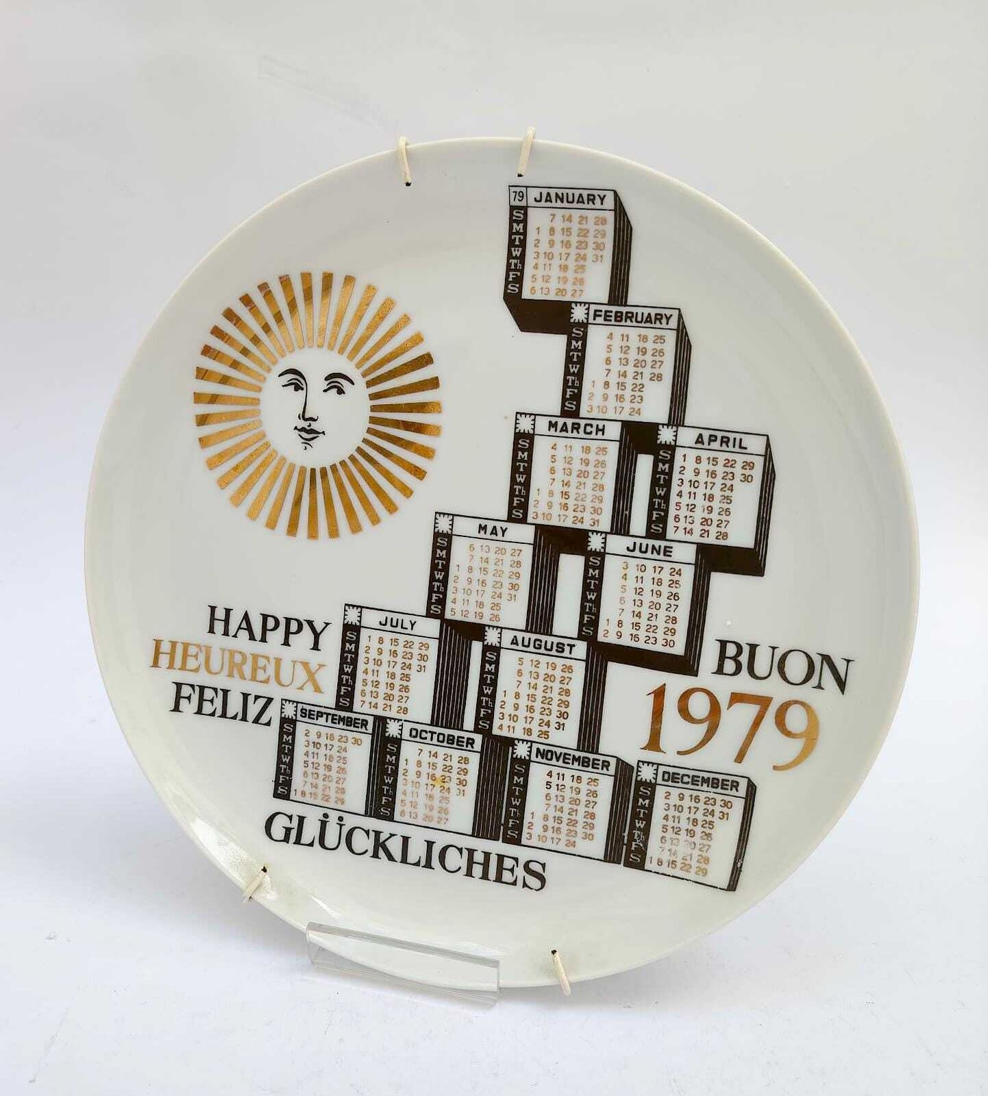Assiette calendrier en céramique vintage Piero Fornasetti Milano 1979, noire et dorée