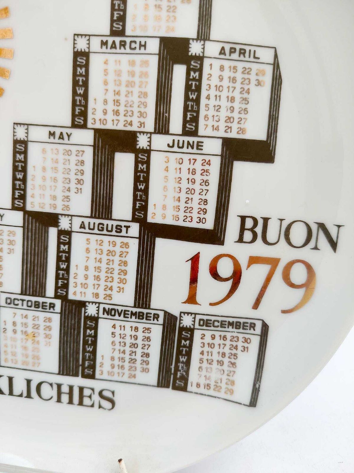 Assiette calendrier en céramique vintage Piero Fornasetti Milano 1979, noire et dorée photo Décoration