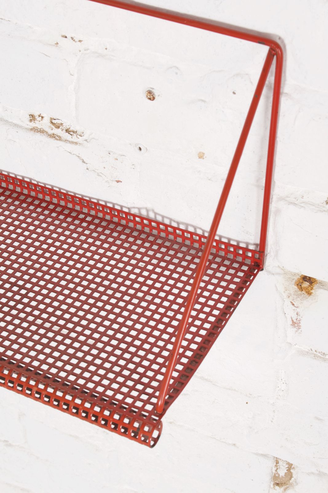 1950s Dutch Modernist Red Perforated Metal Wall Shelf By Tjerk Reijenga For Pilastro photo for sale