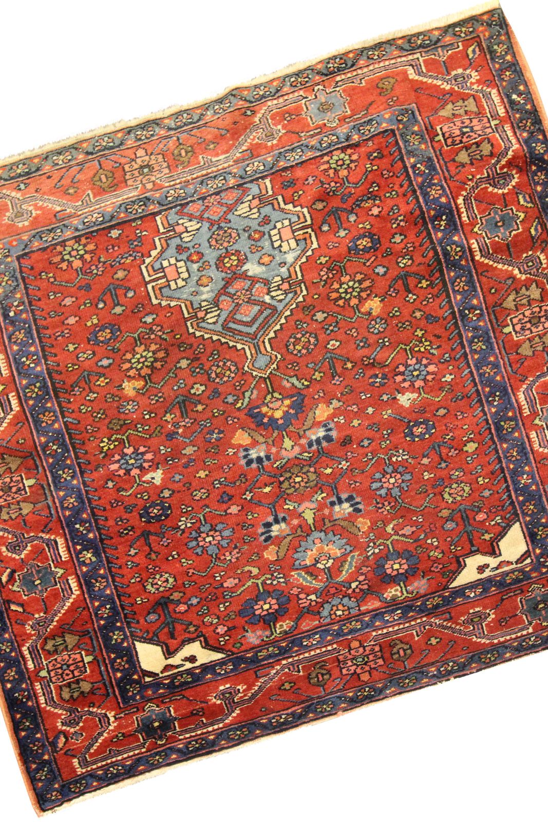 Traditioneel Oosters tapijt, roestkleurig antiek vloerkleed, handgeweven wollen tapijt photo Textiel
