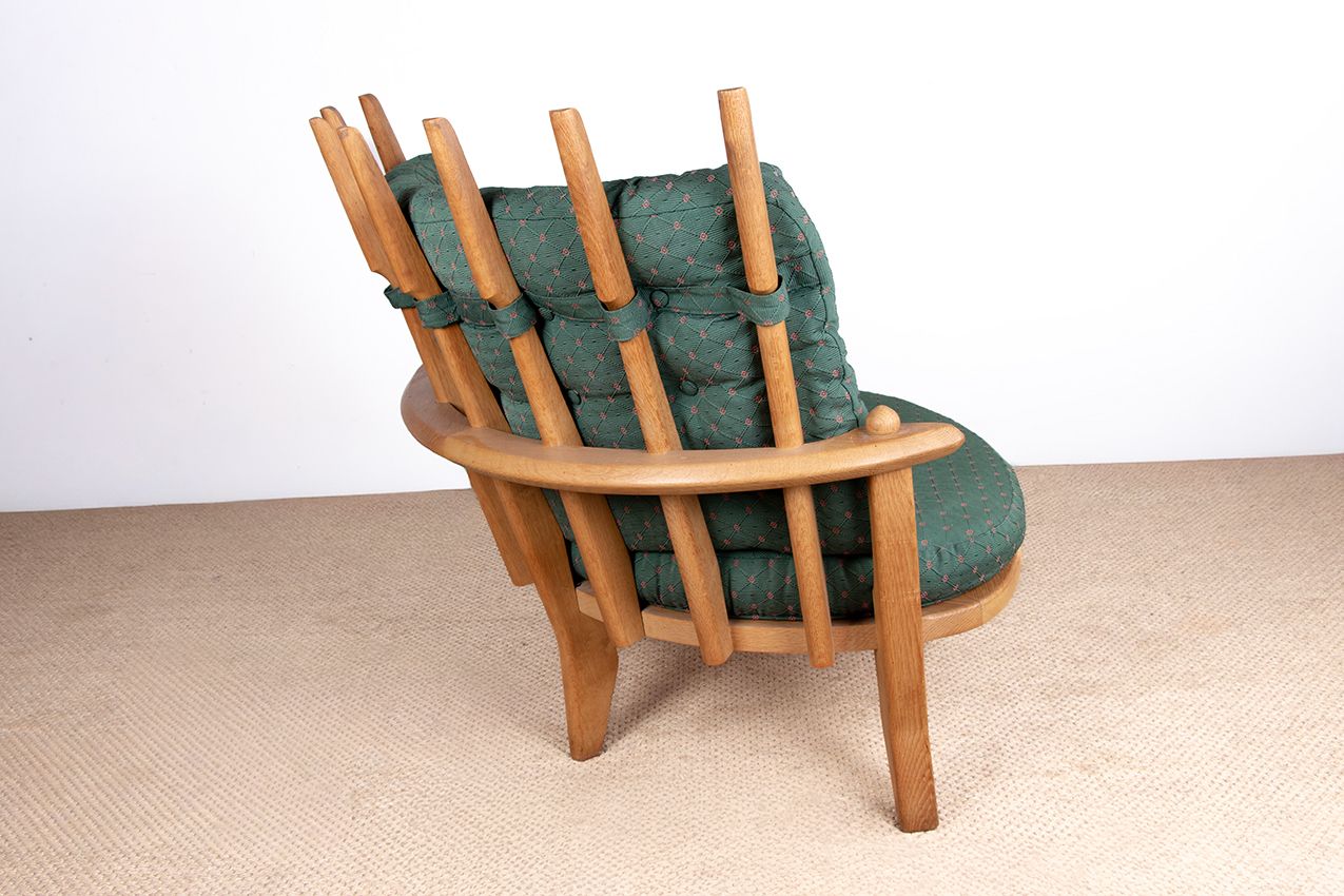 photo buy Grand fauteuil français en chêne massif par Guillerme et Chambron pour Votre Maison, 1960.