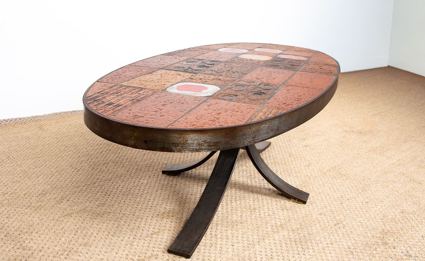 2500.0 Lava Stone, Ceramic, And Steel Coffee Table By Jean Jaffeux, 1960. photo
